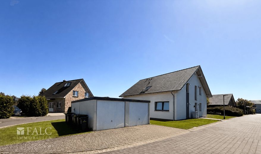 Hell. Offen. Energieeffizient. KfW-40-Wohnung mit sonniger Terrasse und Garage – Außenansicht - Bild 6