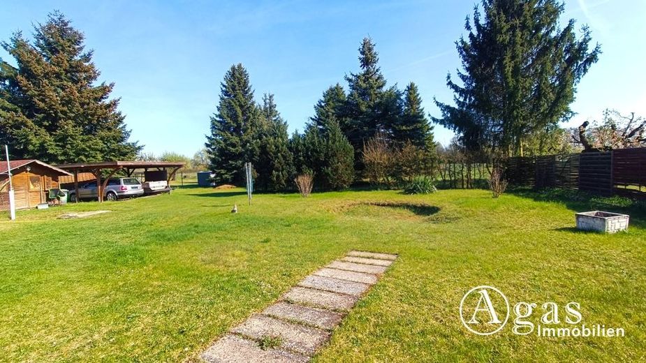 zwei vermietete Einfamilienhäuser mit Sonnen-Garten in Golßen / OT Gersdorf - mit Sanierungsbedarf – Garten