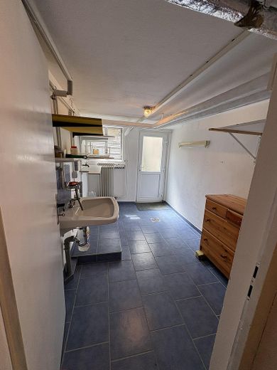 Zuhause fühlen in Reihenmittelhaus in ruhiger, familiärer Lage – Waschküche