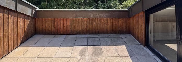 Sanierte 3-Zimmer-Dachgeschosswohnung mit Dachterrasse und Tiefgaragenplatz – Blick von Dachterrasse