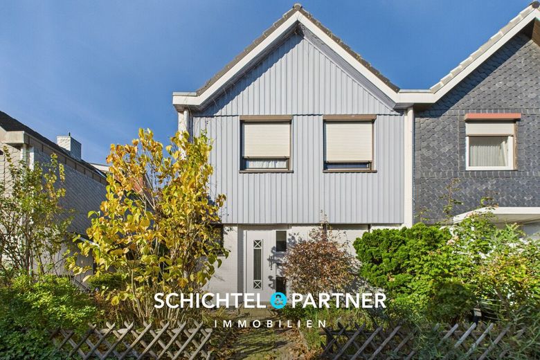 Osterholz-Scharmbeck | Gepflegtes Reihenendhaus mit schönen Garten &amp; Garage – S&amp;P | Frontansicht