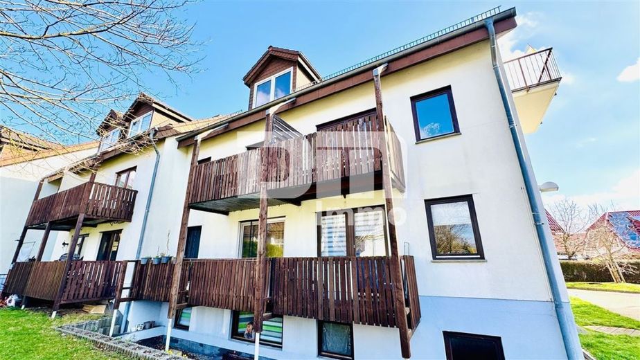 Kompaktes Apartment BJ 1991 im Souterrain in ruhiger Wohnanlage – Frontansicht Titel