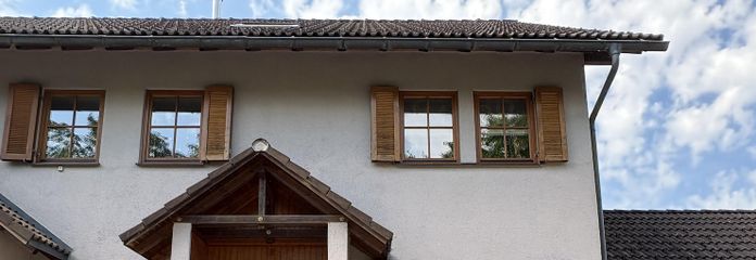 Appartement en copropriété avec véranda, terrasse et jardin – Eingang zur Wohnung