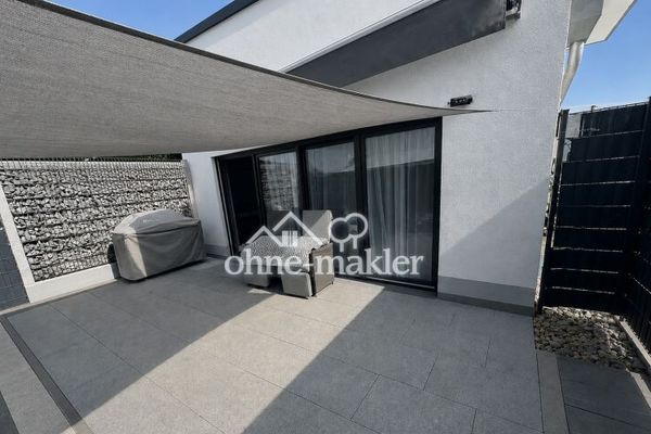 Attraktive Erdgeschosswohnung mit Terrasse & großem Garten